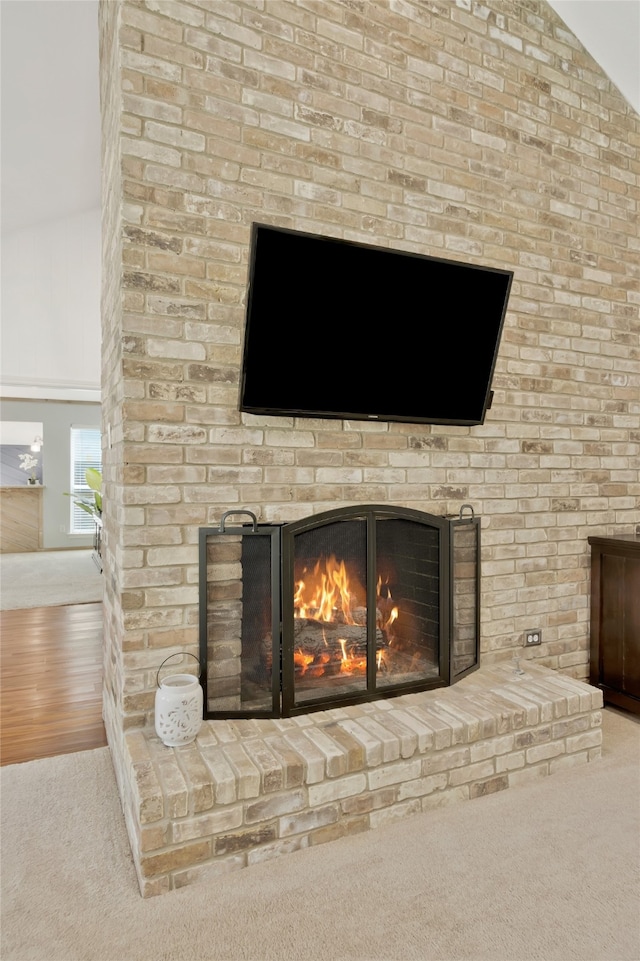7624 Kevin Dr, Dallas, TX 75248 - detailed view of a brick fireplace and carpet floors
