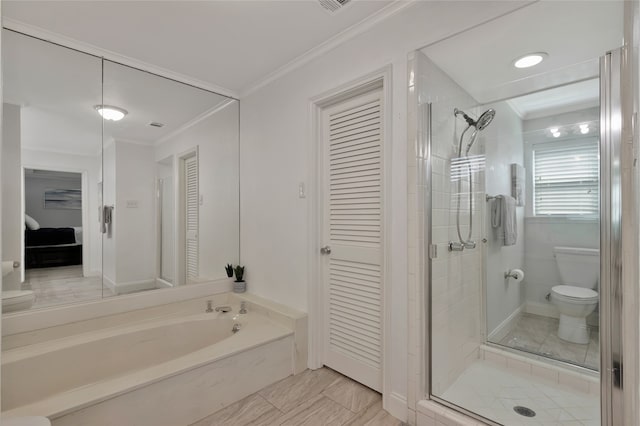 7624 Kevin Dr, Dallas, TX 75248 - full bathroom with a stall shower, toilet, ornamental molding, a closet, and a garden tub