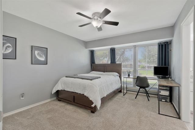 7624 Kevin Dr, Dallas, TX 75248 - carpeted bedroom with multiple windows, ceiling fan, baseboards, and an office area
