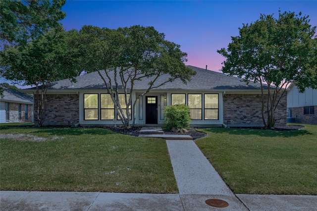 7624 Kevin Dr, Dallas, TX 75248 - ranch-style home featuring a front yard, brick siding, and roof with shingles
