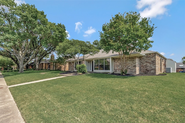 7624 Kevin Dr, Dallas, TX 75248 - view of grassy yard with central air condition unit