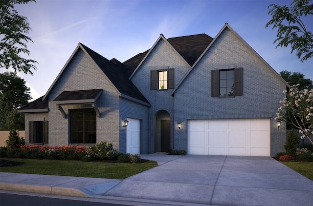 2112 Wakefield Ln, Allen, TX 75013 - view of front of home featuring brick siding, driveway, a front lawn, and an attached garage