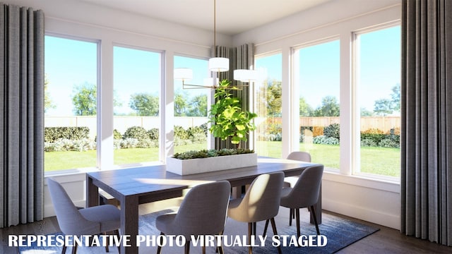 2112 Wakefield Ln, Allen, TX 75013 - dining space with dark wood-style flooring and baseboards