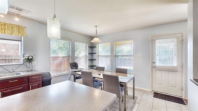 2225 Marion Dr, Mckinney, TX 75072 - dining area featuring plenty of natural light and light tile patterned floors
