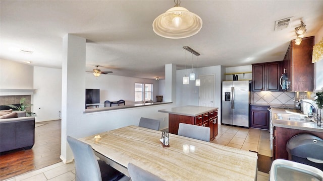 2225 Marion Dr, Mckinney, TX 75072 - dining area with a ceiling fan and light tile patterned flooring