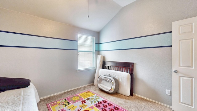 2225 Marion Dr, Mckinney, TX 75072 - carpeted bedroom with lofted ceiling, a textured wall, and baseboards