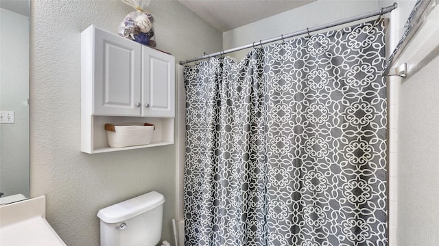 2225 Marion Dr, Mckinney, TX 75072 - full bathroom featuring a shower with shower curtain and toilet