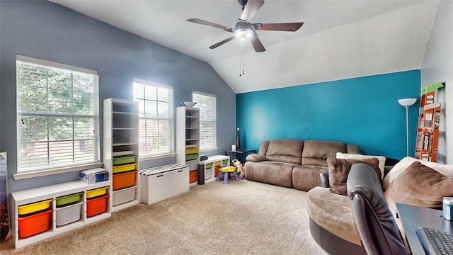 2225 Marion Dr, Mckinney, TX 75072 - living area featuring vaulted ceiling, ceiling fan, light colored carpet, and plenty of natural light