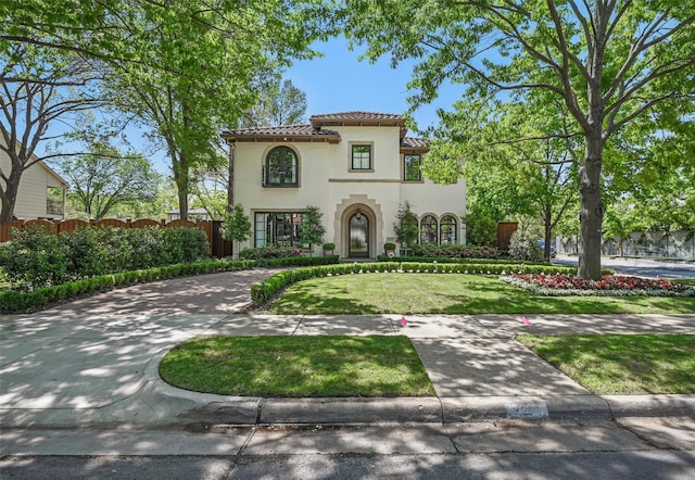 3219 Saint Johns Dr, Highland Park, TX 75205 - mediterranean / spanish house with a tile roof and stucco siding