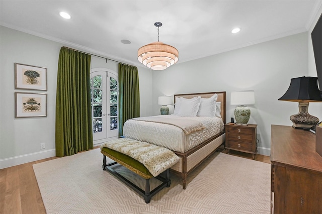3219 Saint Johns Dr, Highland Park, TX 75205 - bedroom with crown molding, baseboards, recessed lighting, wood finished floors, and french doors