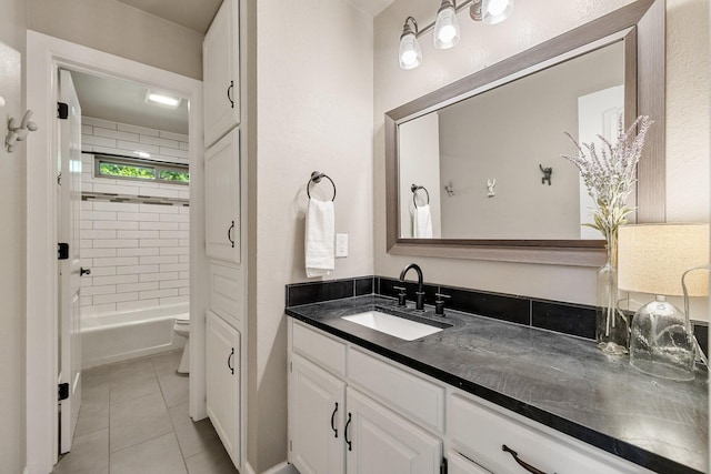 941 Mccampbell Rd, Mansfield, TX 76063 - full bathroom with tile patterned floors, vanity, tub / shower combination, toilet, and baseboards