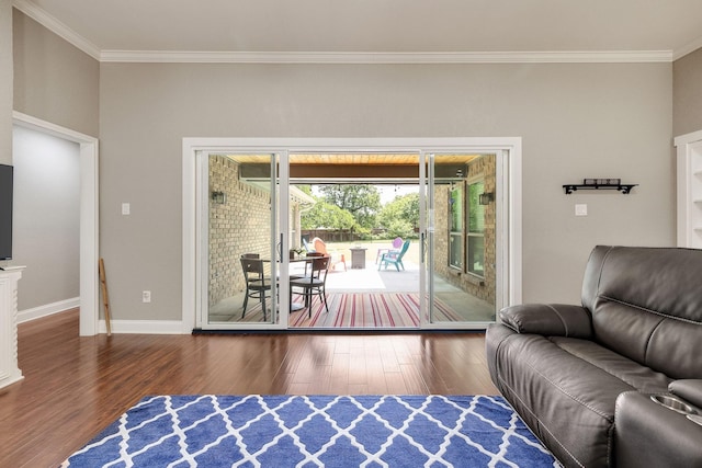 941 Mccampbell Rd, Mansfield, TX 76063 - living area with wood finished floors, ornamental molding, and baseboards