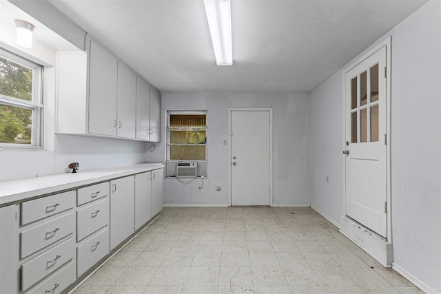3824 Arundel Ave, Fort Worth, TX 76109 - kitchen featuring plenty of natural light, light countertops, light flooring, and baseboards