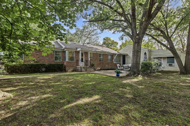 3824 Arundel Ave, Fort Worth, TX 76109 - view of front of property with brick siding, a patio, and a front lawn