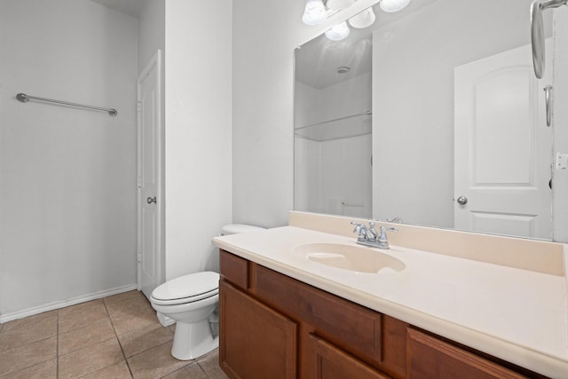 303 Stonegate Blvd, Alvarado, TX 76009 - bathroom with toilet, vanity, tile patterned floors, baseboards, and a shower