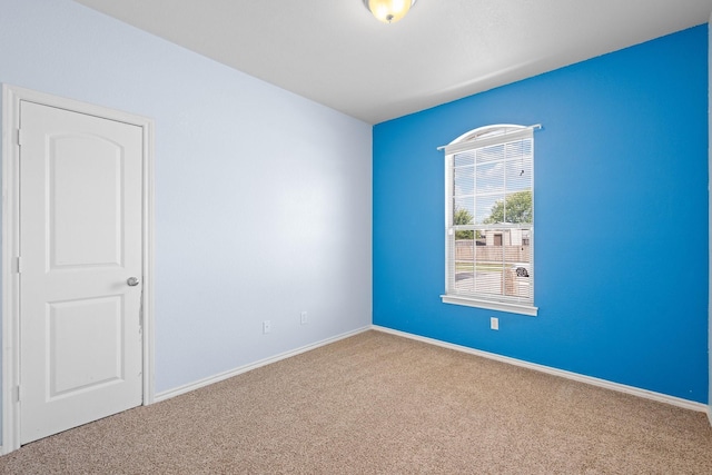 303 Stonegate Blvd, Alvarado, TX 76009 - carpeted spare room featuring baseboards