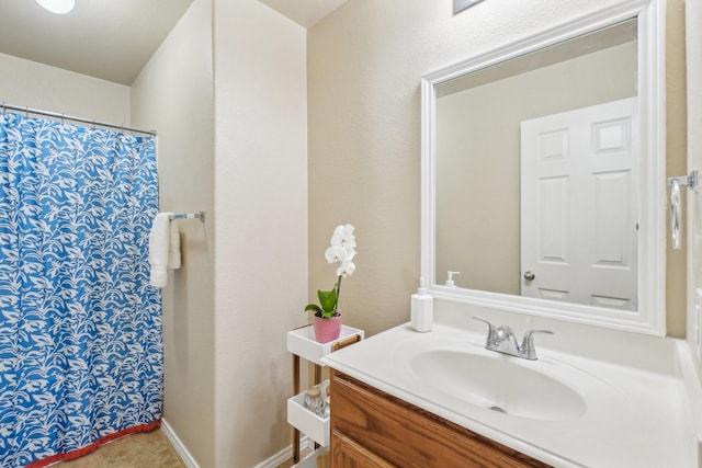 5530 Exeter Dr, Prosper, TX 75078 - full bath featuring vanity, tile patterned floors, and a shower with curtain