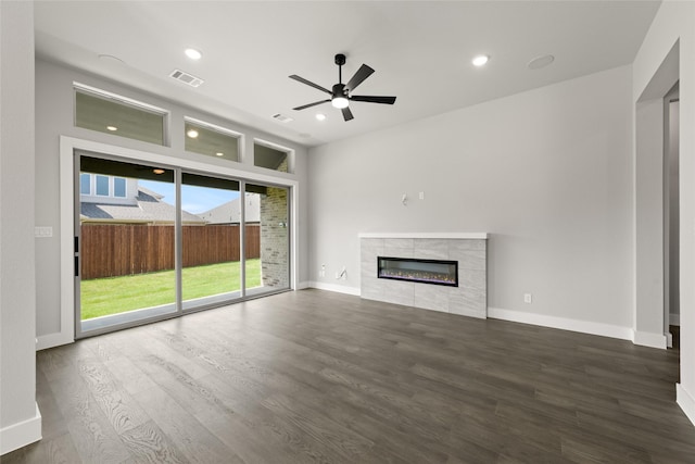 329 Lovett Ln, Burleson, TX 76028 - unfurnished living room featuring ceiling fan, wood finished floors, a fireplace, baseboards, and recessed lighting