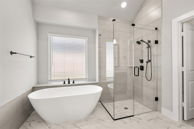 329 Lovett Ln, Burleson, TX 76028 - bathroom with marble finish floors, a freestanding bath, a shower stall, recessed lighting, and vaulted ceiling