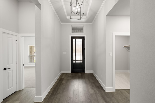 329 Lovett Ln, Burleson, TX 76028 - entrance foyer featuring a chandelier, dark wood-type flooring, ornamental molding, and baseboards