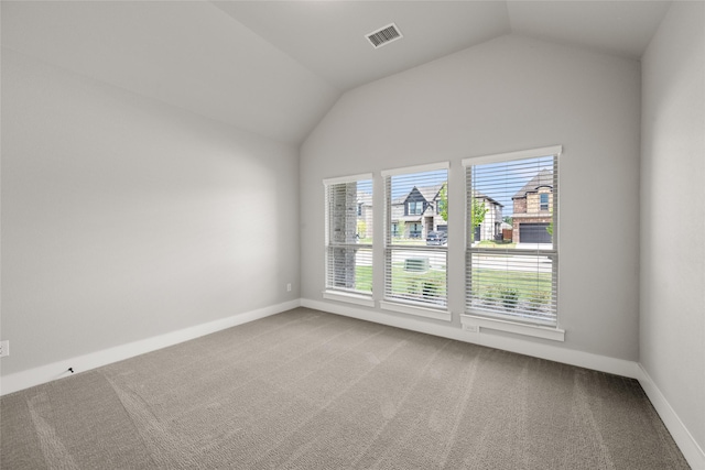 329 Lovett Ln, Burleson, TX 76028 - carpeted spare room with vaulted ceiling and baseboards