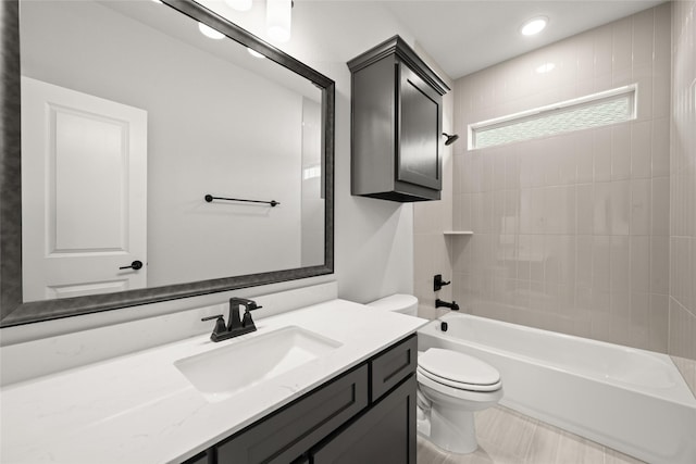 329 Lovett Ln, Burleson, TX 76028 - full bath featuring toilet, vanity, and tub / shower combination