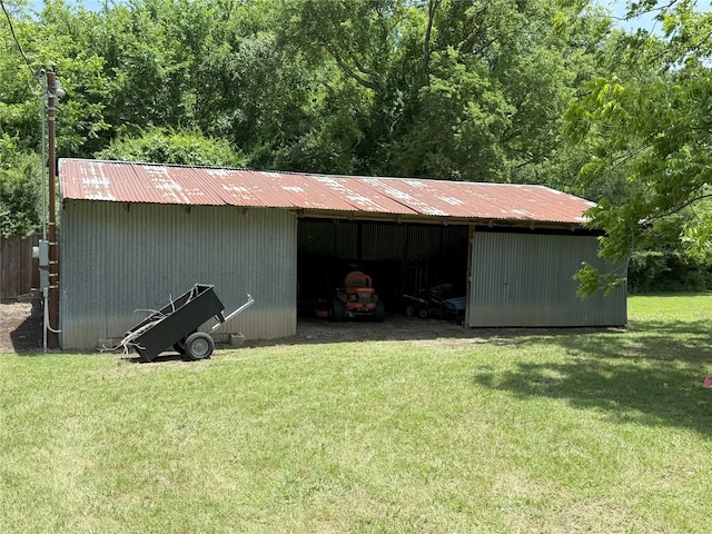 3335 Hedrick Ln, Princeton, TX 75407 - view of pole building with a yard and a carport
