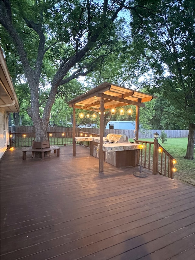 3335 Hedrick Ln, Princeton, TX 75407 - deck with exterior kitchen, a fenced backyard, and grilling area