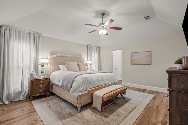 3304 Bowden Hill Ln N, Colleyville, TX 76034 - bedroom featuring vaulted ceiling, light wood-style floors, a ceiling fan, and baseboards