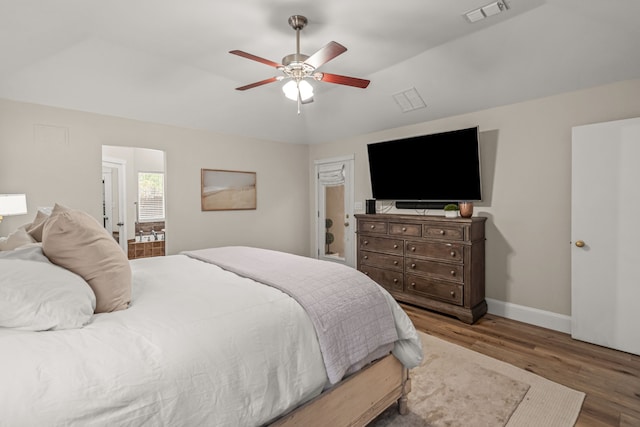3304 Bowden Hill Ln N, Colleyville, TX 76034 - bedroom with wood finished floors, baseboards, ceiling fan, and vaulted ceiling