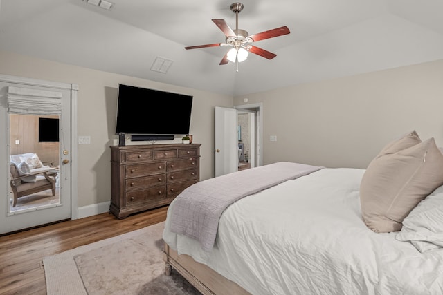 3304 Bowden Hill Ln N, Colleyville, TX 76034 - bedroom featuring wood finished floors, vaulted ceiling, baseboards, and ceiling fan
