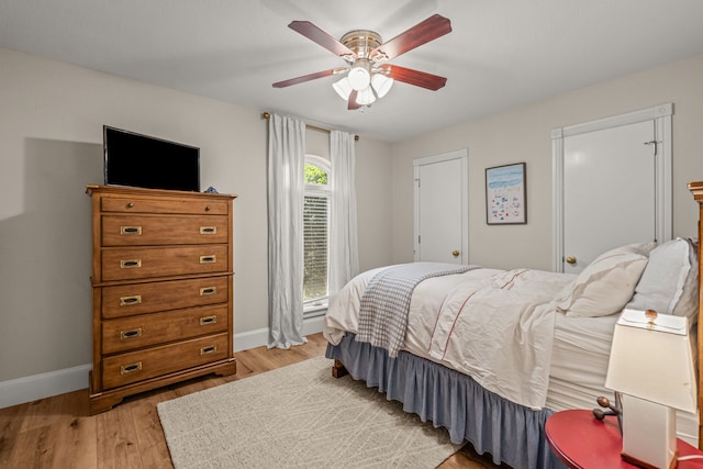 3304 Bowden Hill Ln N, Colleyville, TX 76034 - bedroom with baseboards, light wood-style floors, and ceiling fan