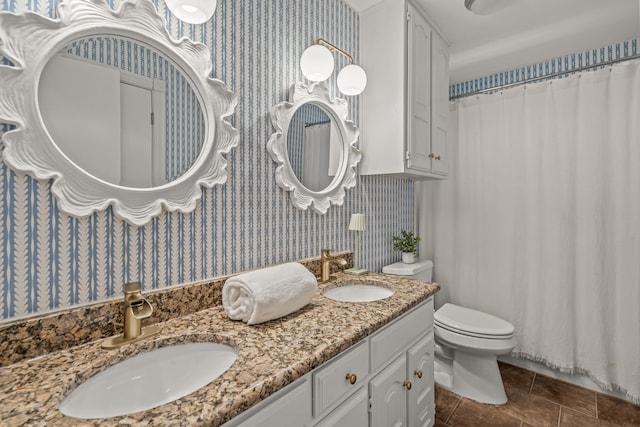 3304 Bowden Hill Ln N, Colleyville, TX 76034 - full bath featuring wallpapered walls, double vanity, tile patterned floors, and toilet