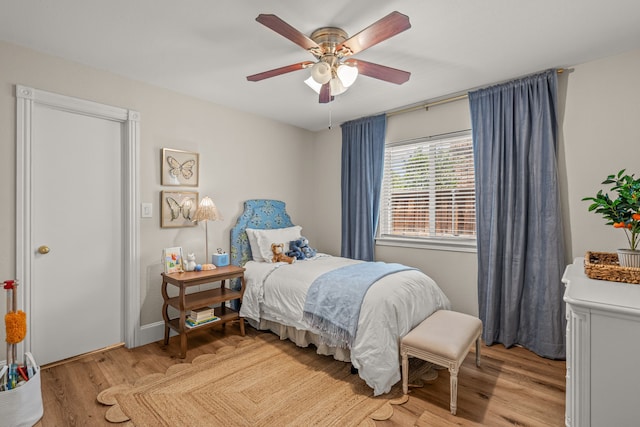 3304 Bowden Hill Ln N, Colleyville, TX 76034 - bedroom featuring light wood-type flooring, a ceiling fan, and baseboards