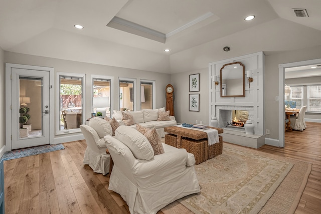 3304 Bowden Hill Ln N, Colleyville, TX 76034 - living area featuring a raised ceiling, light wood-style flooring, a multi sided fireplace, recessed lighting, and baseboards