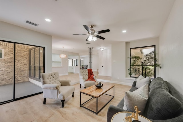 3 Collins Ct, Richardson, TX 75081 - living room with light wood-style floors, a ceiling fan, and recessed lighting
