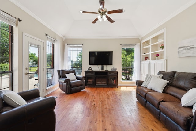 110 Man O War Ln, Fairview, TX 75069 - living room featuring light wood-type flooring, healthy amount of natural light, ceiling fan, lofted ceiling, and built in features