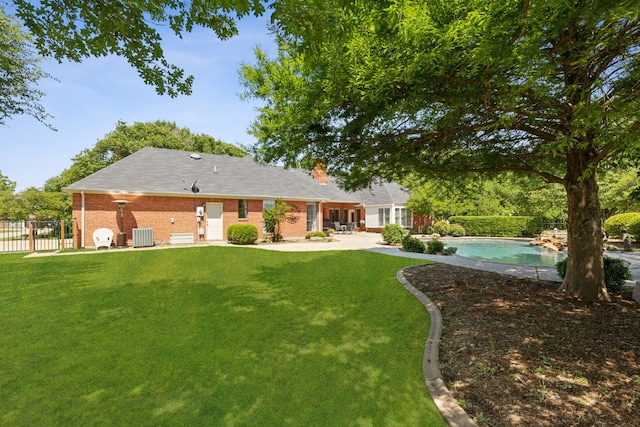 110 Man O War Ln, Fairview, TX 75069 - rear view of property with a chimney, an outdoor pool, a patio, brick siding, and cooling unit