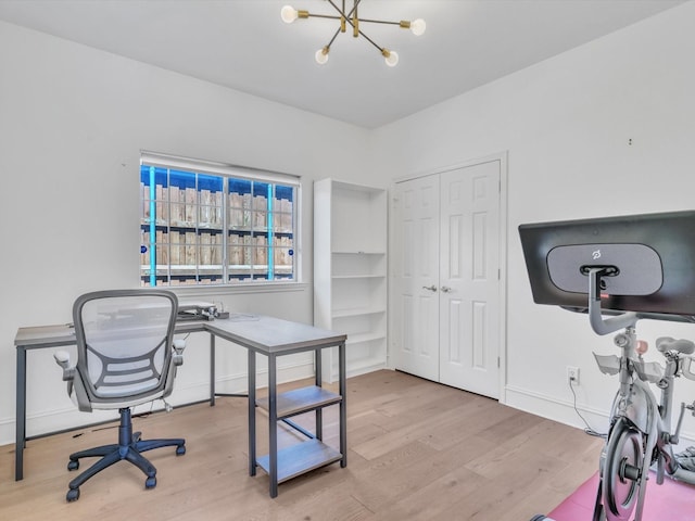 5904 Sandhills Cir, Plano, TX 75093 - office featuring wood finished floors, a chandelier, and baseboards