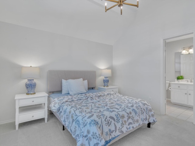 5904 Sandhills Cir, Plano, TX 75093 - bedroom with light colored carpet, lofted ceiling, baseboards, connected bathroom, and a chandelier