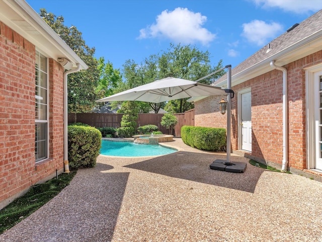 5904 Sandhills Cir, Plano, TX 75093 - view of swimming pool featuring fence, a patio, and a pool with connected hot tub