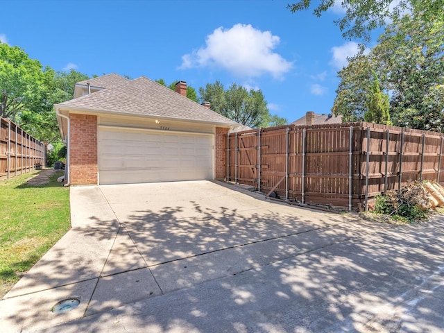 5904 Sandhills Cir, Plano, TX 75093 - garage with fence and concrete driveway