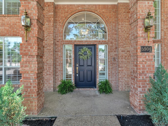 5904 Sandhills Cir, Plano, TX 75093 - doorway to property with brick siding