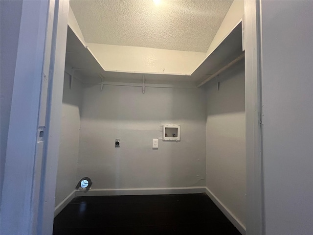 2722 Locust Ave, Dallas, TX 75216 - washroom featuring hookup for a washing machine, a textured ceiling, hookup for an electric dryer, and baseboards