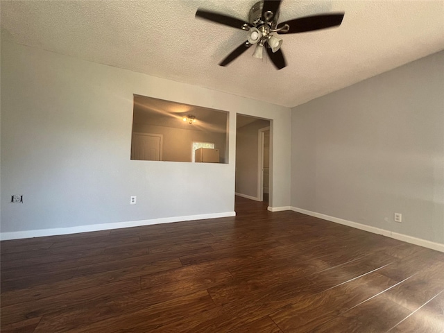 2722 Locust Ave, Dallas, TX 75216 - spare room with a ceiling fan, dark wood-style flooring, a textured ceiling, and baseboards