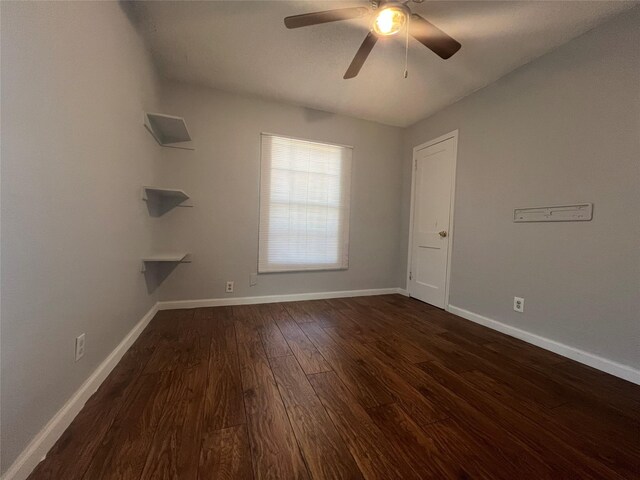 2722 Locust Ave, Dallas, TX 75216 - empty room featuring dark wood finished floors, baseboards, and ceiling fan