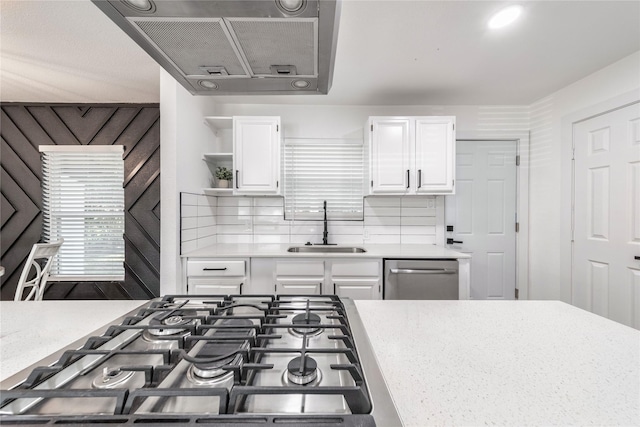 10816 Joaquin Dr, Dallas, TX 75228 - kitchen featuring a sink, stainless steel appliances, open shelves, and white cabinetry
