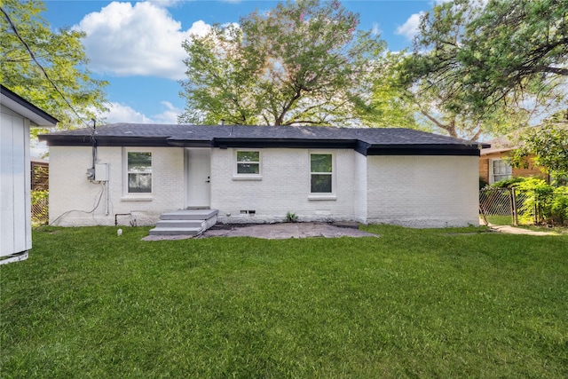 10816 Joaquin Dr, Dallas, TX 75228 - back of house with brick siding and roof with shingles