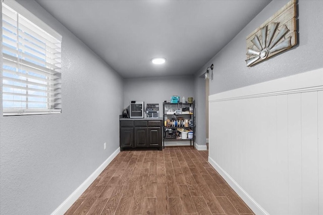 2250 Poolville Cut Off Rd, Poolville, TX 76487 - hallway featuring dark wood finished floors, a textured wall, and baseboards