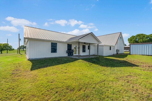 2250 Poolville Cut Off Rd, Poolville, TX 76487 - view of front of house with metal roof, a patio area, a ceiling fan, and a front yard